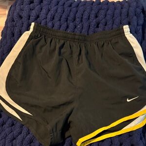 Nike Women's Black Shorts with Yellow and White Accents